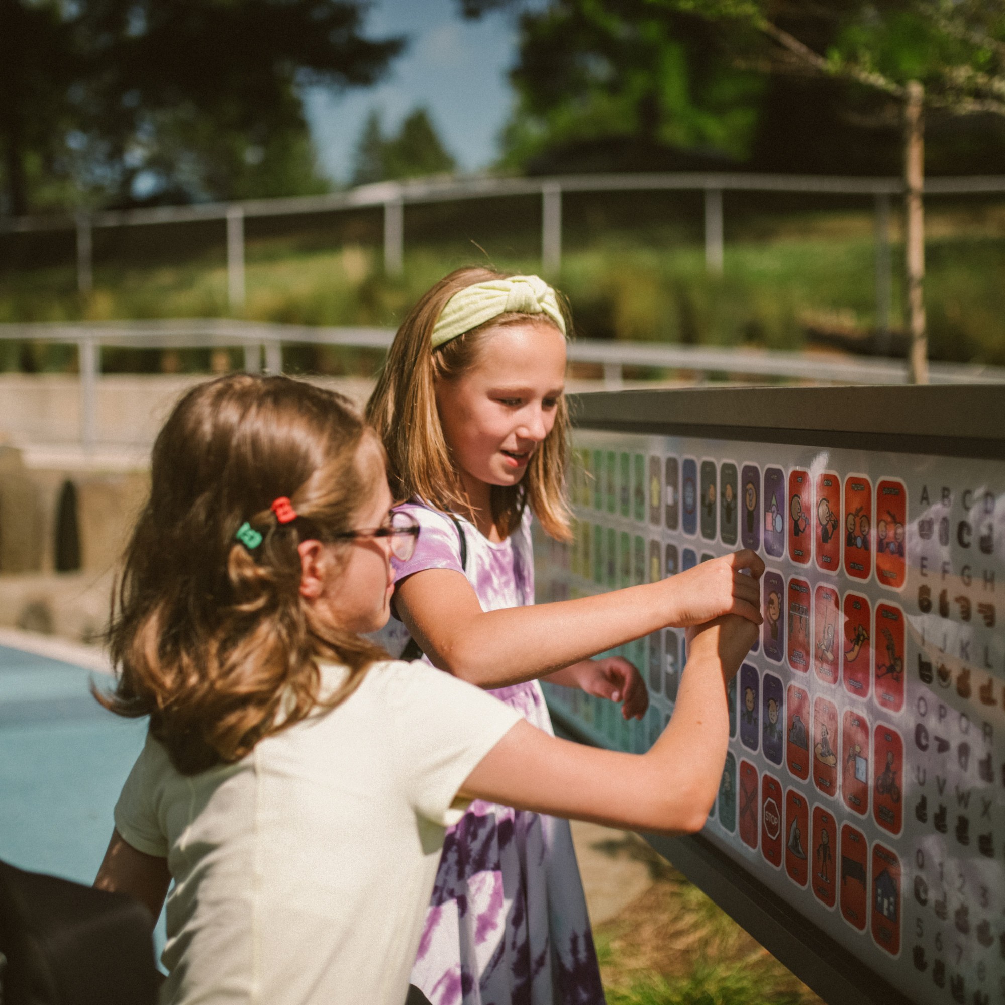 Letter beads spelling dyslexia awareness on a wooden surface